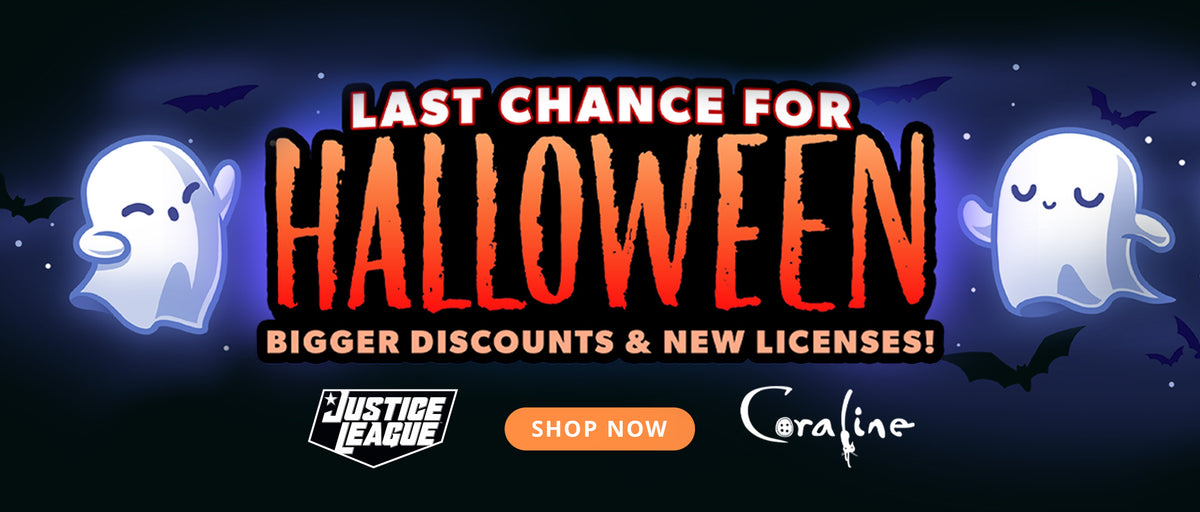 Halloween promotional banner with the text 'LAST CHANCE FOR HALLOWEEN' in large orange letters, 'BIGGER DISCOUNTS & NEW LICENSES!' below, and logos for Justice League and Coraline. The design includes two white cartoon ghosts, black bats, and a dark blue night sky background.