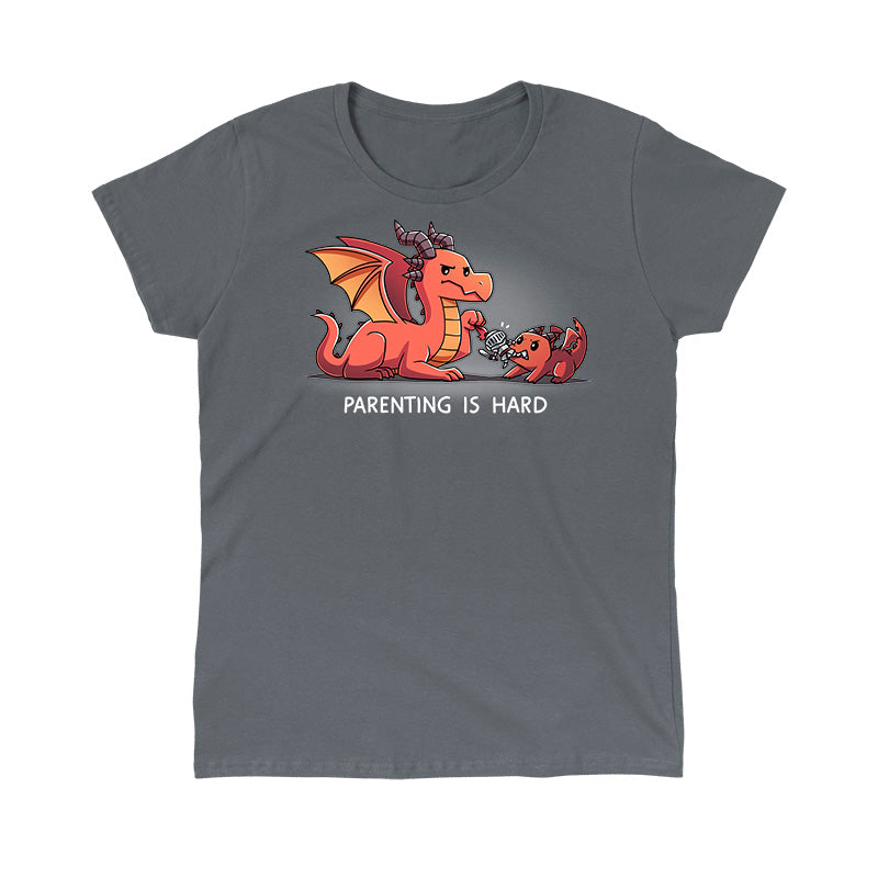 Classic Cotton T-shirt_TeeTurtle charcoal gray Parenting is Hard apparel featuring a parent dragon holding onto a toy knight while its baby dragon grabs it with its mouth.