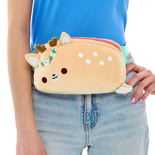A person carrying a cute Plushiverse Flora & Fawn-a Plushie Fanny Pack from the TeeTurtle Kawaii Cuties collection.