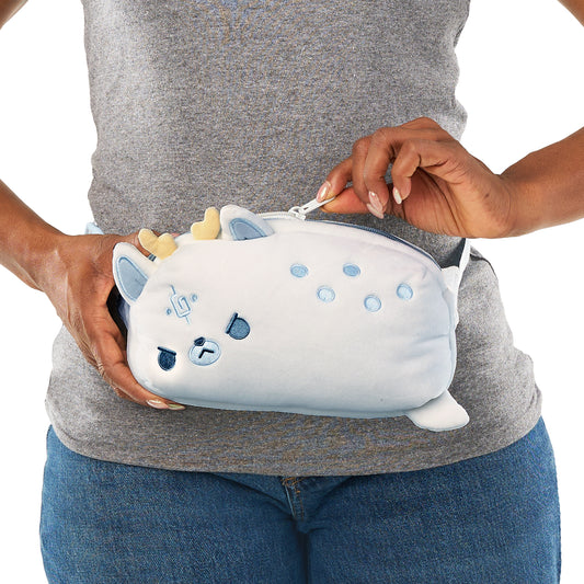 A person holding a Plushiverse White Stag fanny pack from the TeeTurtle Myths & Cryptids Collection.