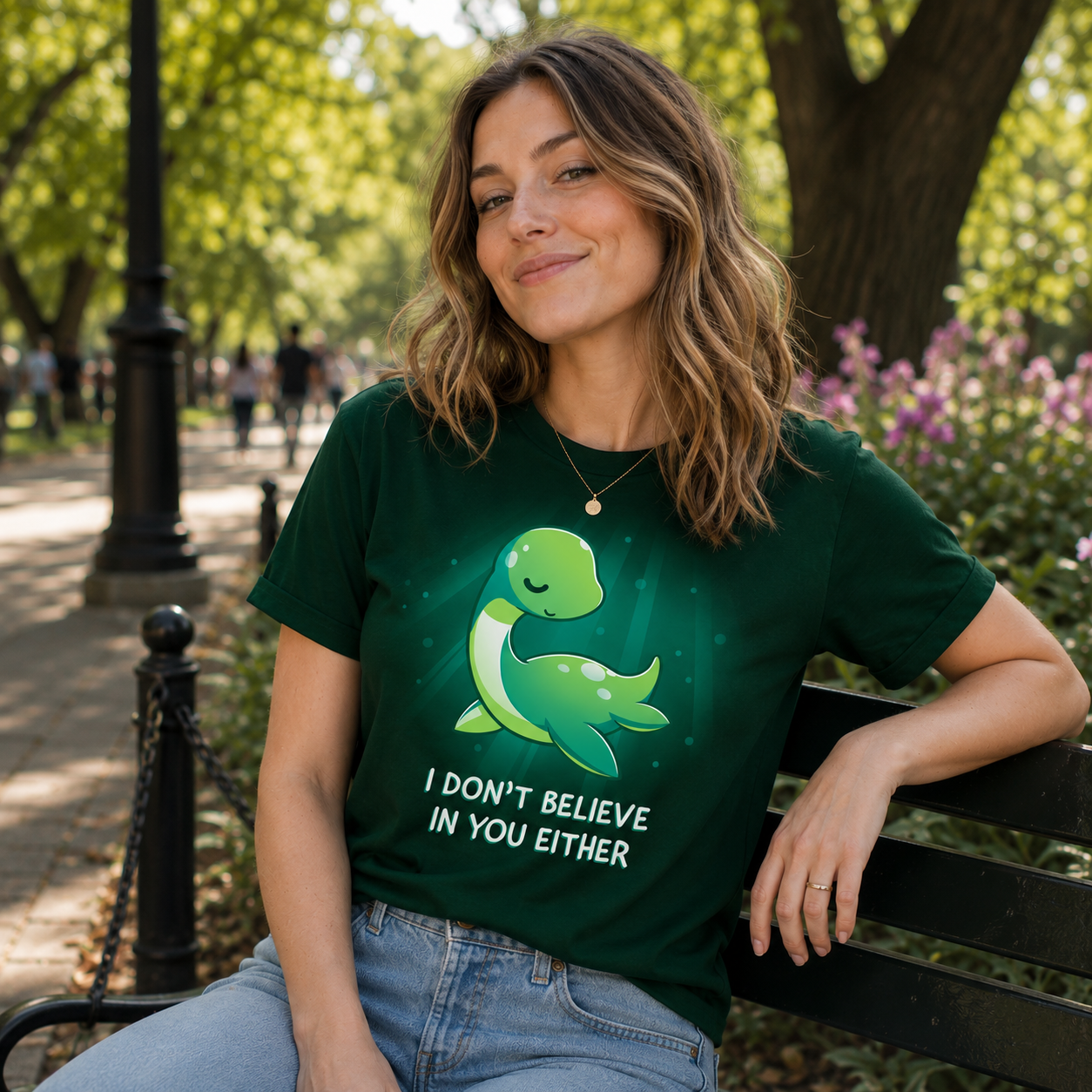 Premium Cotton T-shirt_Teeturtle I Don't Believe In You Either forest green t-shirt featuring the Loch Ness Monster with text that reads "I DON'T BELIEVE IN YOU EITHER."