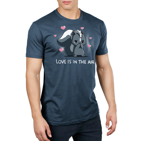 Premium Cotton T-Shirt_TeeTurtle denim blue Scentimental Feelings Premium Cotton T-Shirt featuring a skunk standing up on its back legs with its front paws covering its nose, hearts coming out in the background with the caption, "love is in the air".