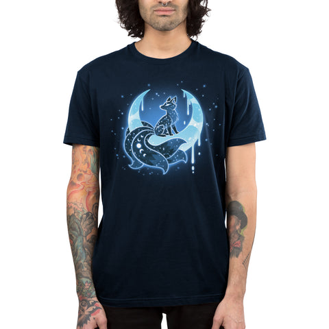 Premium Cotton T-shirt_TeeTurtle navy blue Lunar Kitsune apparel featuring a celestial kitsune perched on the cusp of a crescent moon with its points directed upwards with stars in the background.