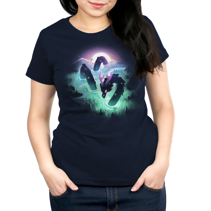 A woman in a navy blue t-shirt, made of super soft ringspun cotton, featuring a glowing green and purple mountainous landscape design from the Cosmic Colors by monsterdigital.