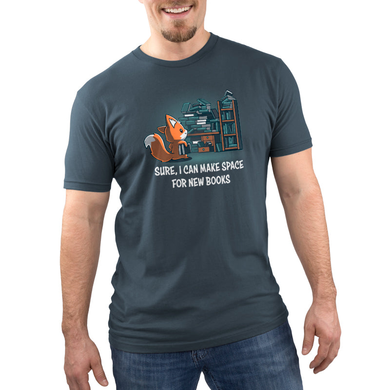 Man wearing a gray unisex tee featuring a cartoon fox and books with the phrase "Sure, I can make space for new Never-Ending Bookshelf" by monsterdigital.