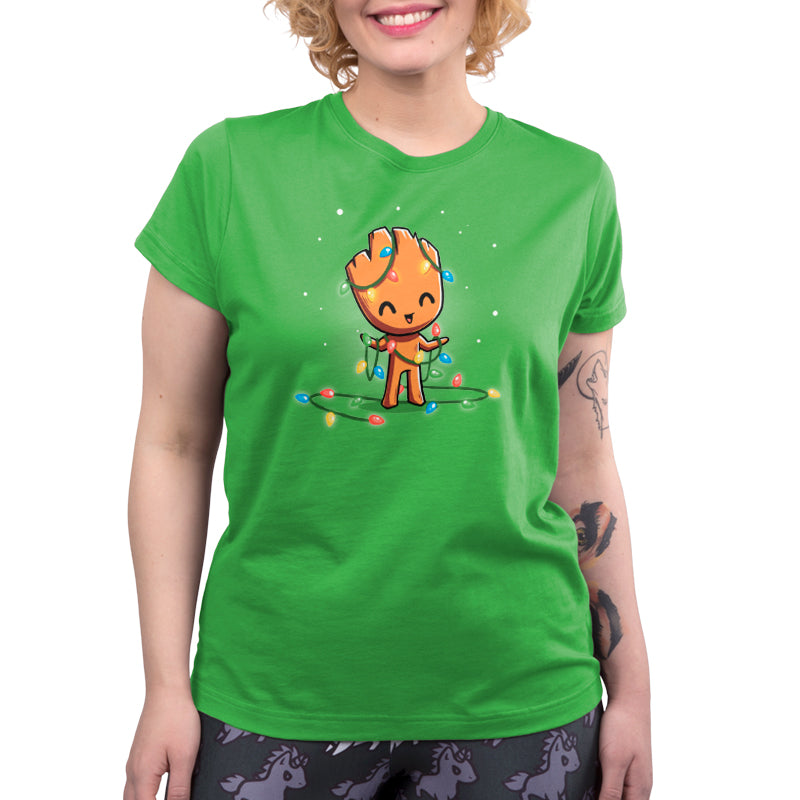 A Tangled Up Groot women's t-shirt with an image of a gnome casually holding a Christmas tree by Marvel.