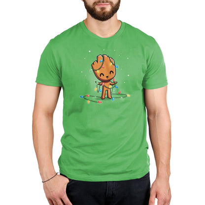 A Marvel Tangled Up Groot t-shirt featuring the lovable tree-like character, with a green background resembling a Christmas tree.