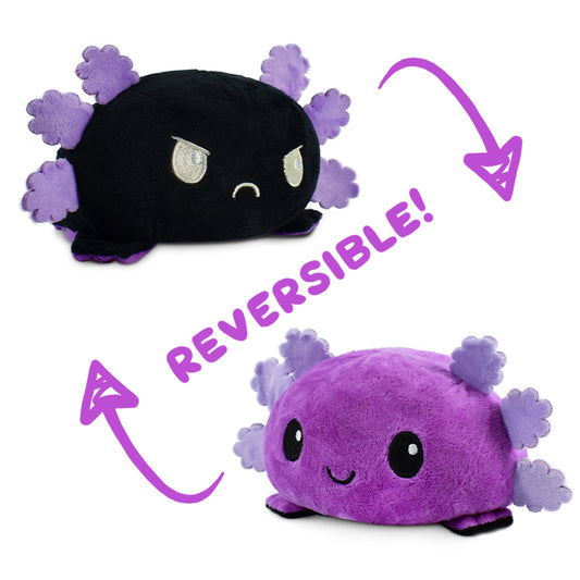 A TeeTurtle Reversible Axolotl Plushie (Black + Purple) with the words 