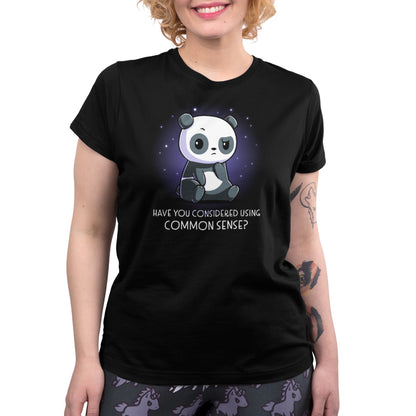 A women's black T-shirt with a panda bear on it from TeeTurtle, showcasing the product "Have You Considered Using Common Sense?