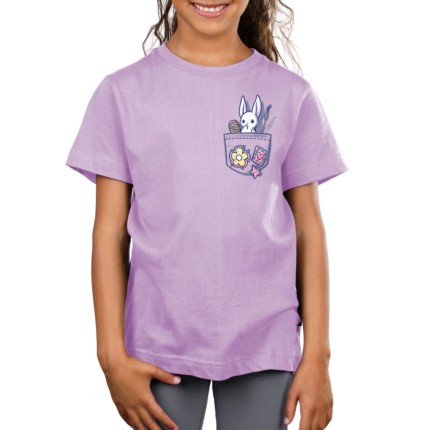 A girl wearing a lavender t-shirt with a Crafty Bunny in Your Pocket, showcasing her TeeTurtle project.