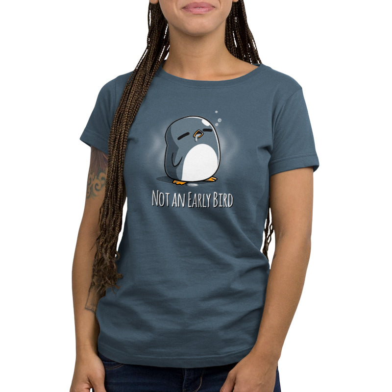 A woman wearing a TeeTurtle "Not an Early Bird" blue denim t-shirt.