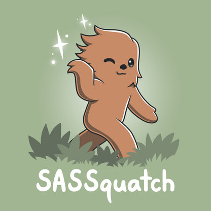A cartoon illustration of a sassy sasquatch winking and posing on a TeeTurtle unisex tee, with the pun "SASSquatch" written below.