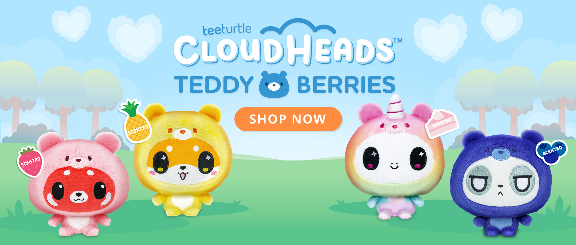 Four colorful teddy bear characters with a 'Shop Now' button on a blue sky background.