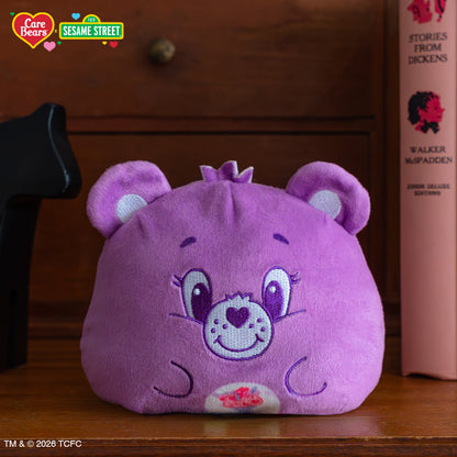 Share Bear & Cookie Monster 4" Reversible Plushie on a bookshelf
