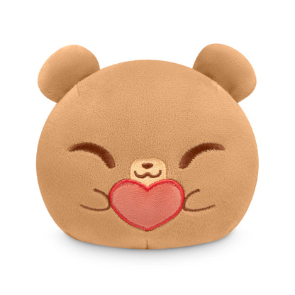 A TeeTurtle Plushiverse Unbearably Cute 4" Reversible Plushie bear with a heart on its face, perfect for Valentine's Day.