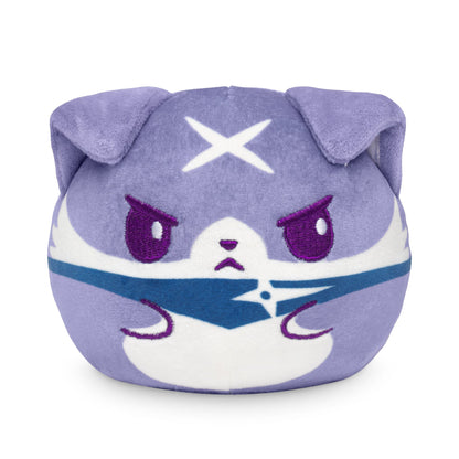 A Plushiverse Palamute 4" Reversible Plushie with a purple color scheme, displaying an angry expression with furrowed eyebrows and crossed arms. It has rounded ears, a star symbol on its forehead, and fits perfectly into any TeeTurtle collection.