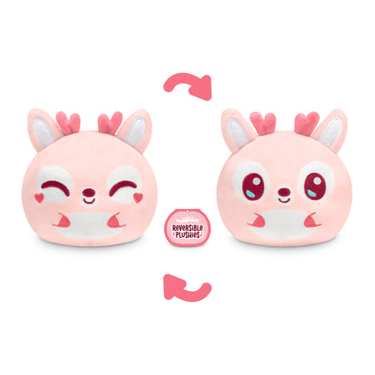 A pink Plushiverse Deer-est Love 4" Reversible Plushie with a heart on it, perfect for TeeTurtle's Valentine's Day collection.
