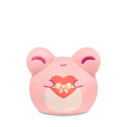 A pink TeeTurtle Plushiverse My Froggy Valentine 4" Reversible Plushie holding a heart.