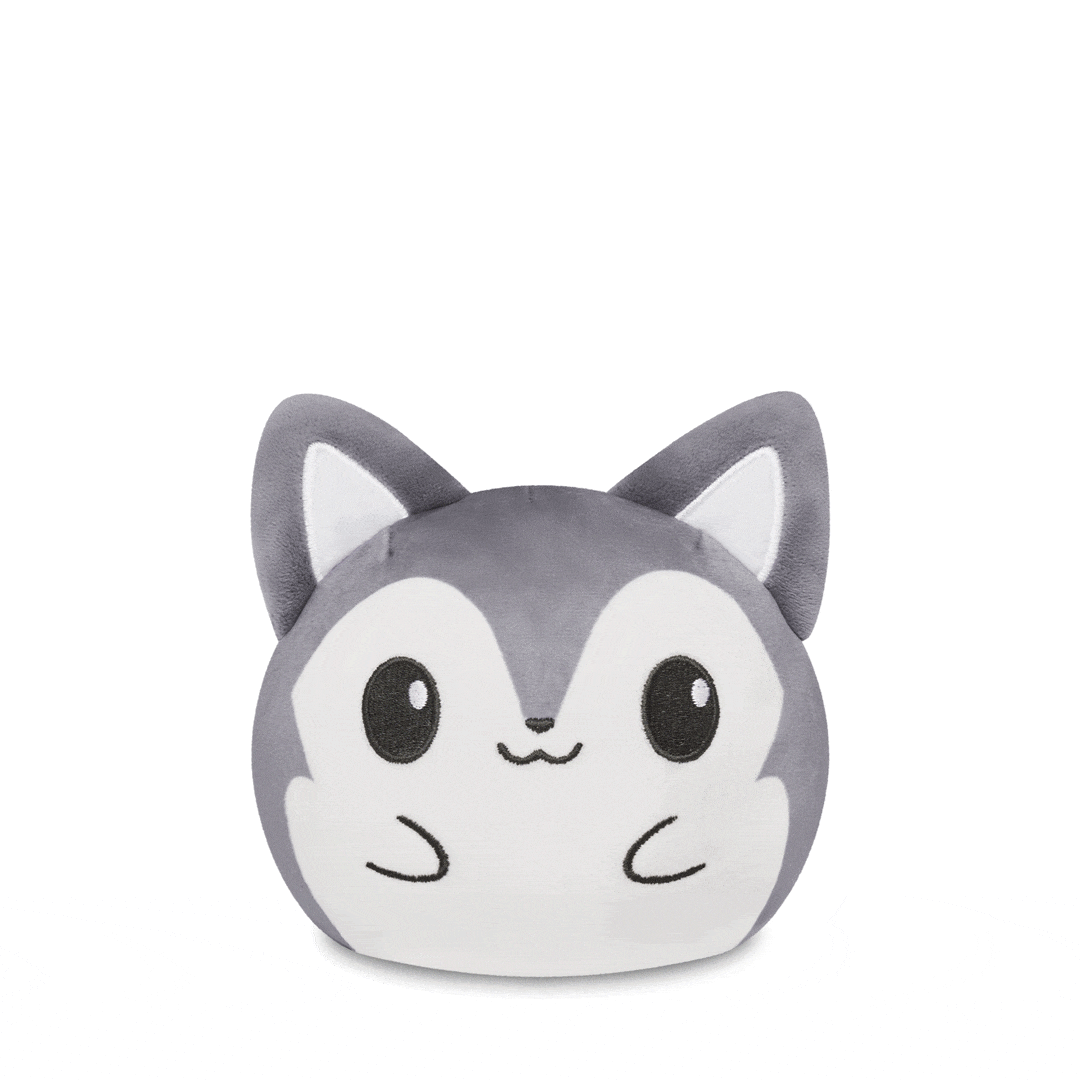 A reversible Plushiverse Fierce Wolf 4" plushie shaped like a cartoon gray cat's head with large eyes, featuring Kawaii Cuties design by TeeTurtle.