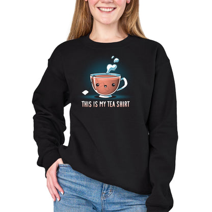 Crew Neck Sweatshirt_TeeTurtle black My Tea Shirt featuring a smiling teacup with a tea bag inside. Text below reads, "This is My Tea Shirt."