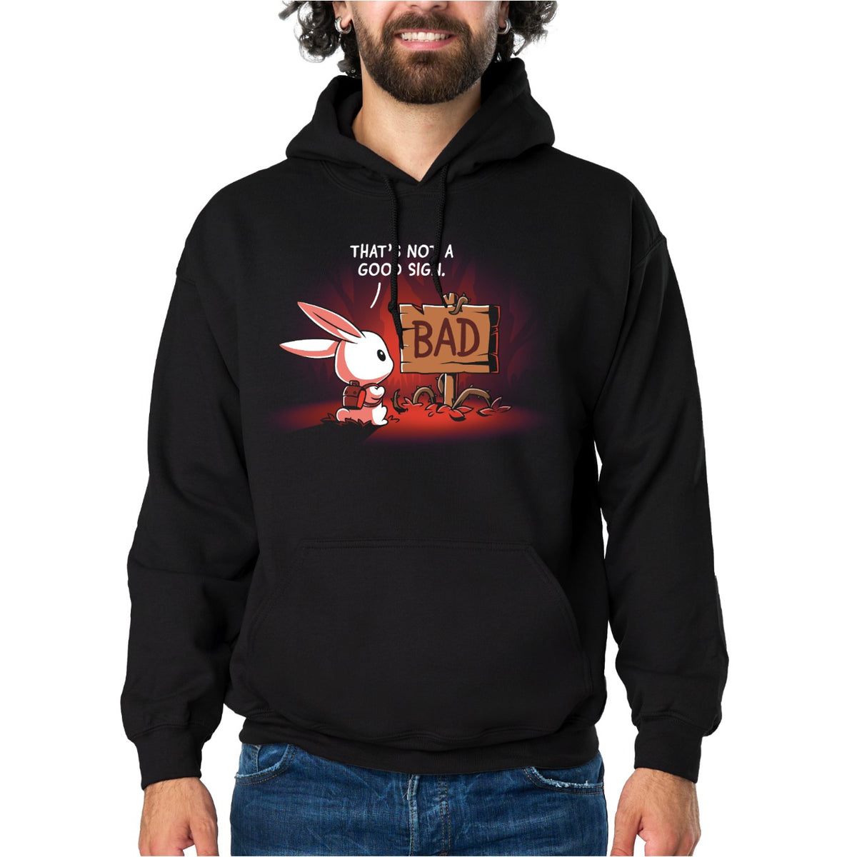 Pullover Hoodie_TeeTurtle black That's Not a Good Sign Pullover Hoodie featuring a white rabbit with a red backpack staring at a broken wooden sign labeled "BAD," with the text "That's Not a Good Sign."