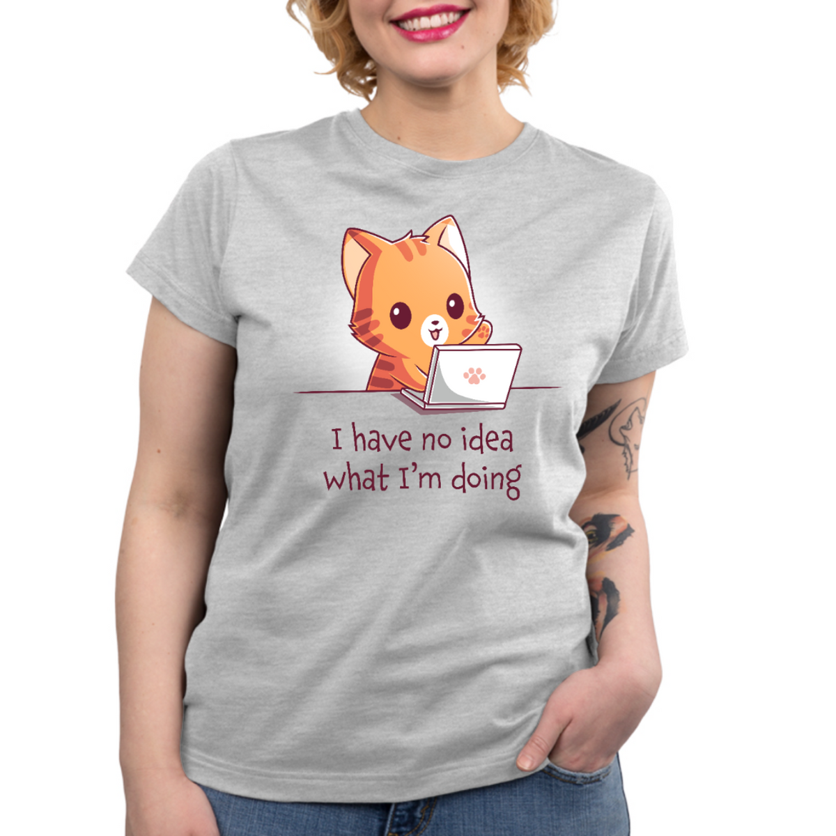 Women's Premium T-Shirt_TeeTurtle light gray I Have No Idea What I'm Doing (Cat) Women's Premium T-Shirt featuring a cheerful orange tabby cat sitting behind a laptop with one paw raised and the text "I have no idea what I'm doing."