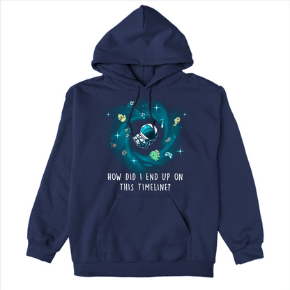 Pullover Hoodie_TeeTurtle navy How Did I End Up On This Timeline Pullover Hoodie featuring an astronaut floating in the middle of a black hole surrounded by random objects like a sword, frying pan, rubber duck, and game controller. Below the illustration the text rreads "How Did I End Up On This Timeline?"