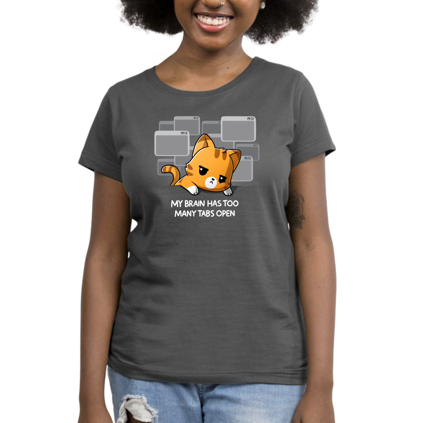 Premium Cotton T-shirt_TeeTurtle charcoal My Brain Has Too Many Tabs Open Premium Cotton T-shirt featuring an overwhelmed orange cat with a serious expression leaning on a table with a bunch of browser tabs open behind them. Text at the bottom reads "My Brain Has Too Many Tabs Open." 