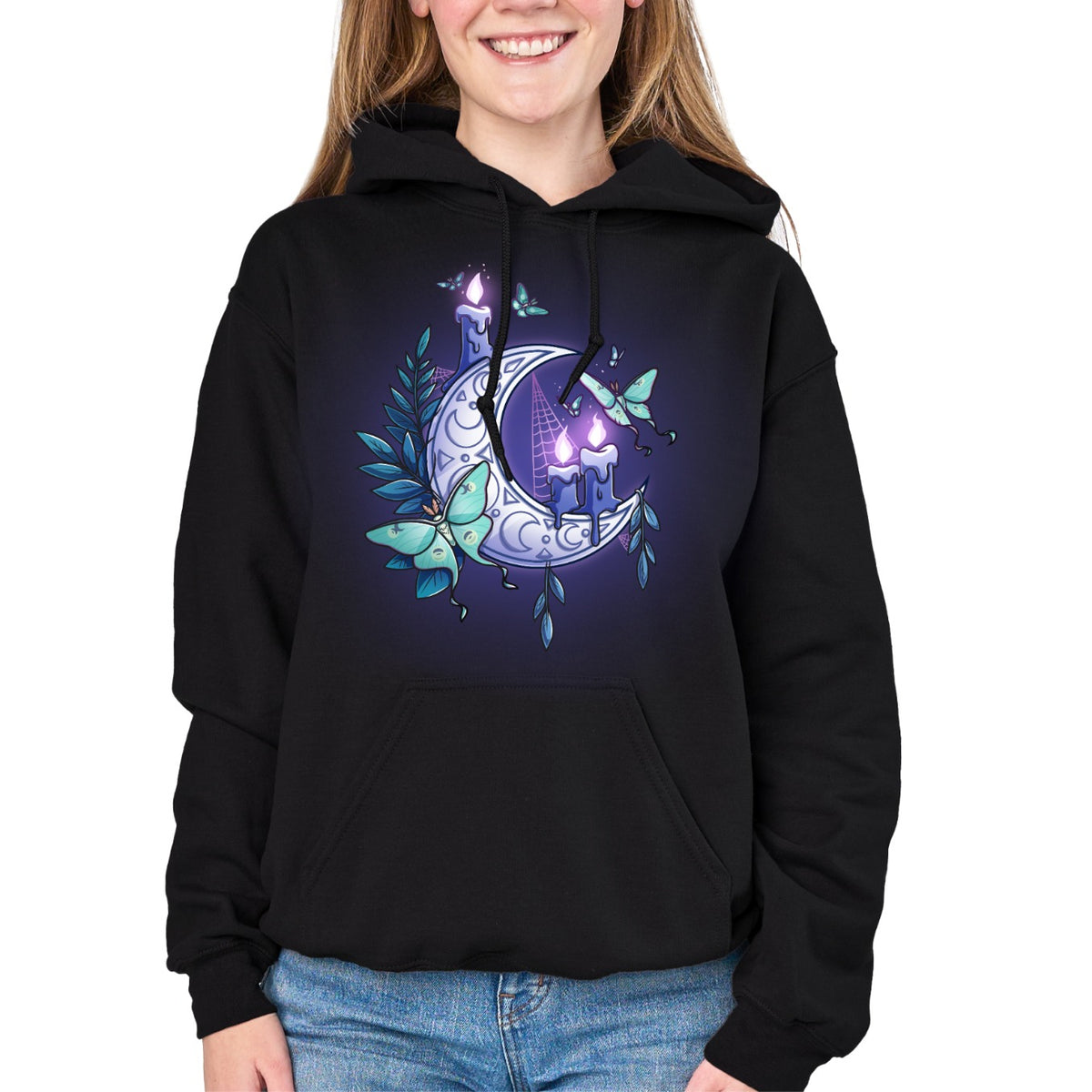 Pullover Hoodie_TeeTurtle black Moonlit Luna Pullover Hoodie featuring a glowing purple crescent moon adorned with candles, a luna moth, and delicate fern leaves in a mystical nighttime design.