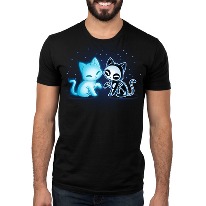 Men's Premium T-shirt_TeeTurtle black Purranormal Pals Men's Premium T-Shirt featuring a glowing blue ghost cat sitting beside a smiling skeleton cat, surrounded by small blue stars.