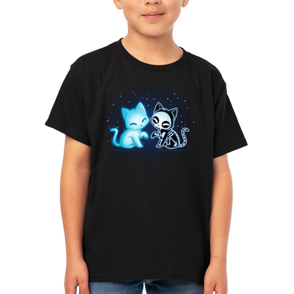 Kids' Classic T-shirt_TeeTurtle black Purranormal Pals Kids' Classic T-Shirt featuring a glowing blue ghost cat sitting beside a smiling skeleton cat, surrounded by small blue stars.