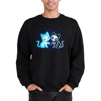 Crew Neck Sweatshirt_TeeTurtle black Purranormal Pals Crew Neck Sweatshirt featuring a glowing blue ghost cat sitting beside a smiling skeleton cat, surrounded by small blue stars.