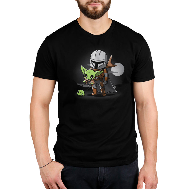 An officially licensed A Clan of Two black t-shirt featuring an image of Baby Yoda from the Mandalorian by Star Wars.
