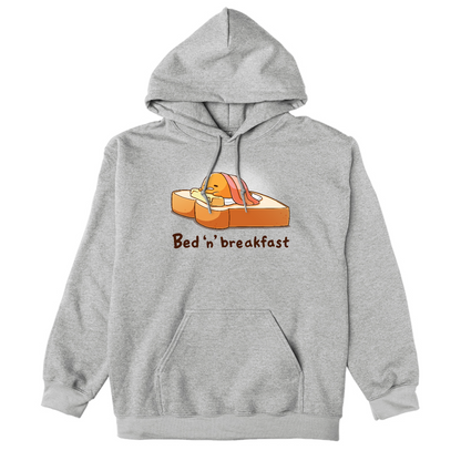 Pullover Hoodie_TeeTurtle heather gray Bed 'n' Breakfast (Gudetama) apparel featuring Gudetama using a piece of toast as a bed, a slice of butter as a pillow, and bacon as a blanket.