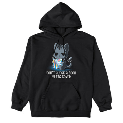 Pullover Hoodie_TeeTurtle Don't Judge a Book By It's Cover black design featuring seemingly grumpy, goth-looking cat wearing a spiked collar and spiked ring on its tail reading a bright, happy-looking rainbow-covered book above the text 'Don't Judge A Book By Its Cover.'