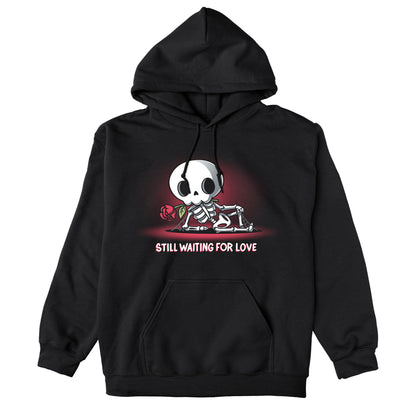 Pullover Hoodie_TeeTurtle Still Waiting For Love black design featuring a skeleton holding a red rose and lying on the ground with the text "Still Waiting for Love."