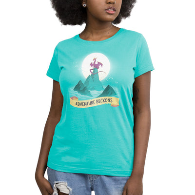 Premium Cotton T-shirt_Teeturtle Adventure Beckons Caribbean Blue apparel featuring a dragon perched on a mountain peak set above the clouds with the sun behind it and the words 'Adventure Beckons' beneath.