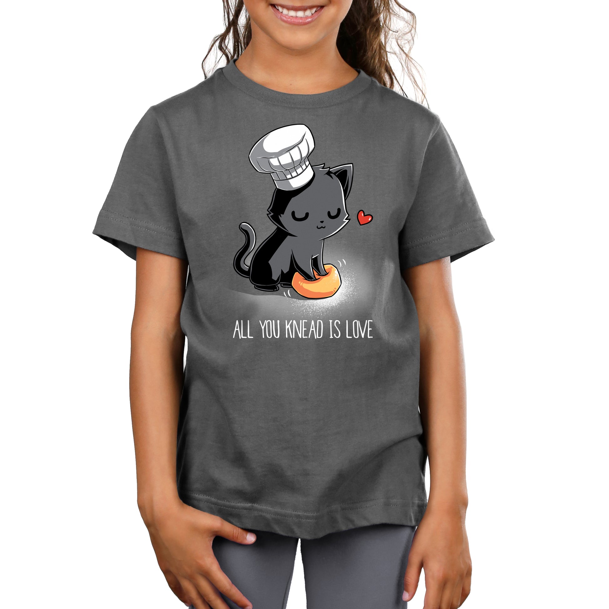 A girl wearing a charcoal gray All You Knead Is Love T-shirt by TeeTurtle.