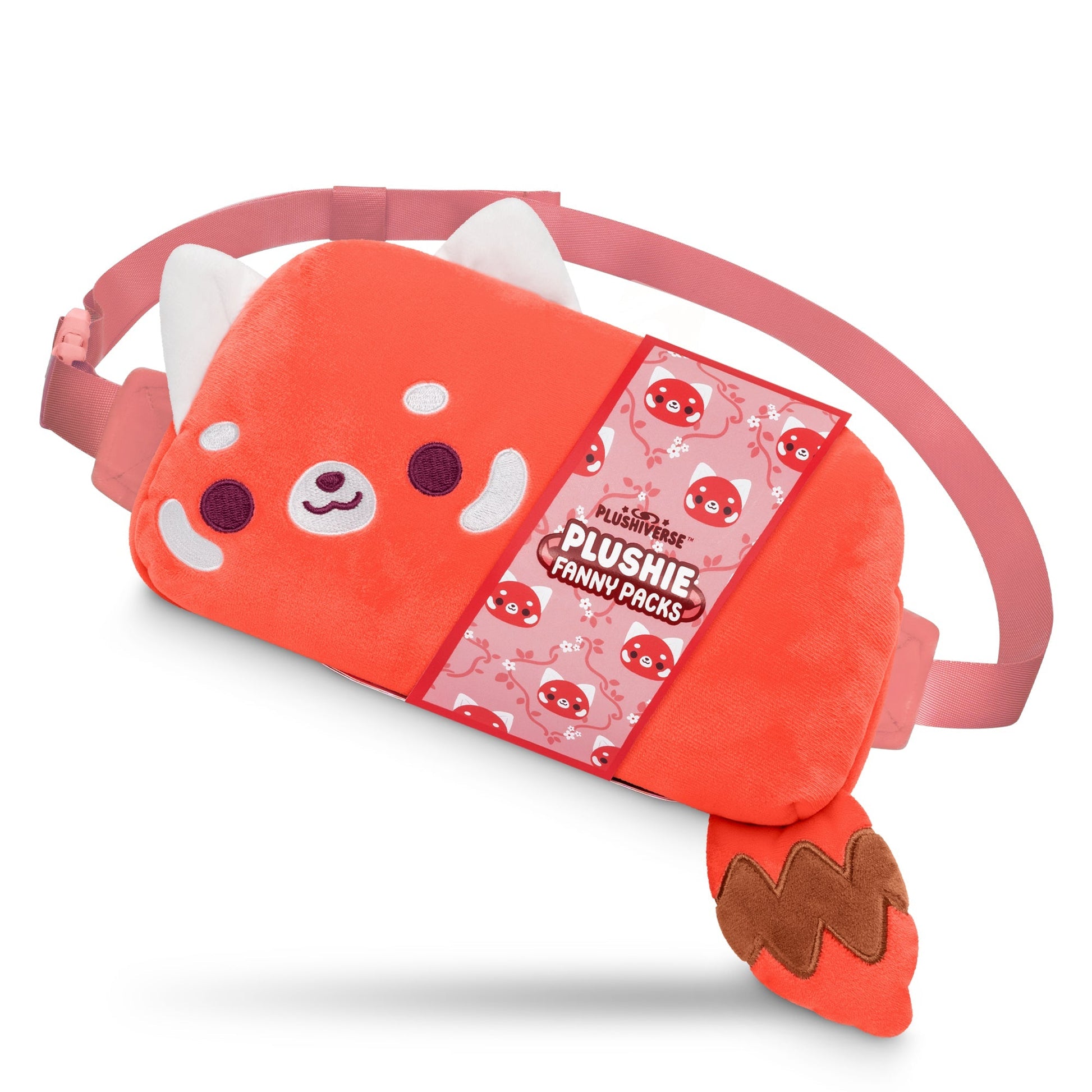 A red plush fanny pack designed like a red panda with a smiling face, white ears, pink cheeks, and a brown striped tail. It features an adjustable belt and a pink tag reading "Plushiverse Cheery Red Panda Plushie Fanny Pack" from the TeeTurtle collection.