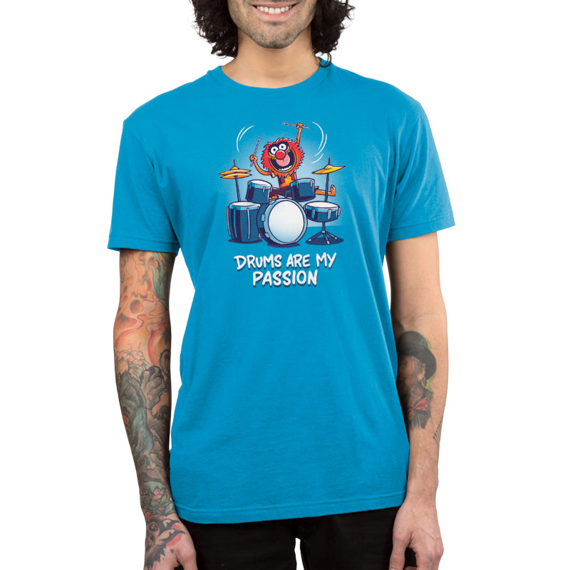 A Muppets-licensed Animal: Drums Are My Passion blue t-shirt with an image of a man playing drums.