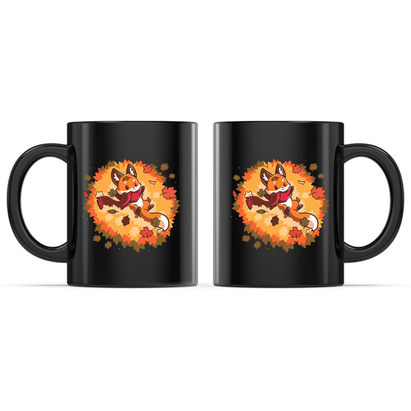 Ceramic Mug_TeeTurtle Autumn Fox black mug featuring a smiling fox wearing a cozy scarf while relaxing in a pile of colorful autumn leaves with leaves gently falling all around.