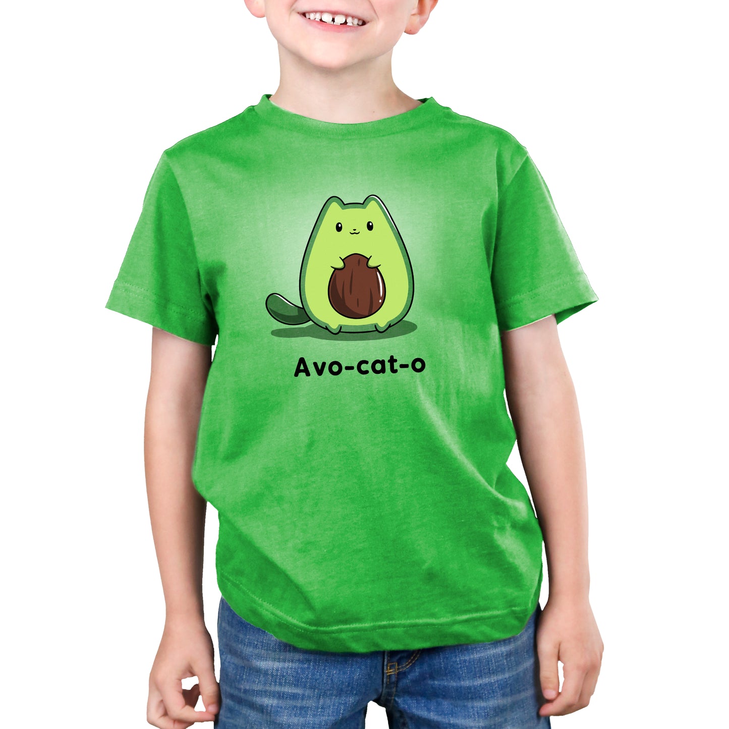 A young boy wearing a green t-shirt with an Avo-cat-o design by TeeTurtle.