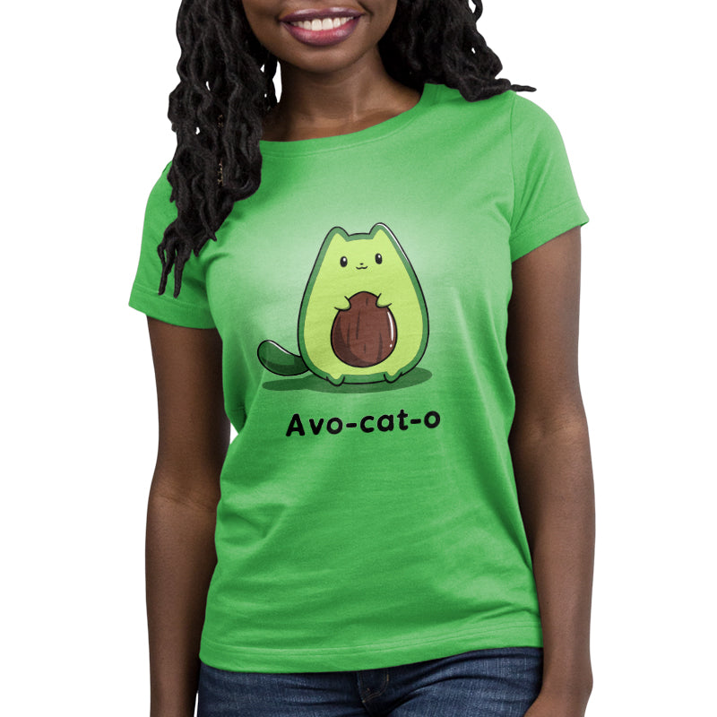 A woman wearing a green Avo-cat-o t-shirt made of ringspun cotton by TeeTurtle.