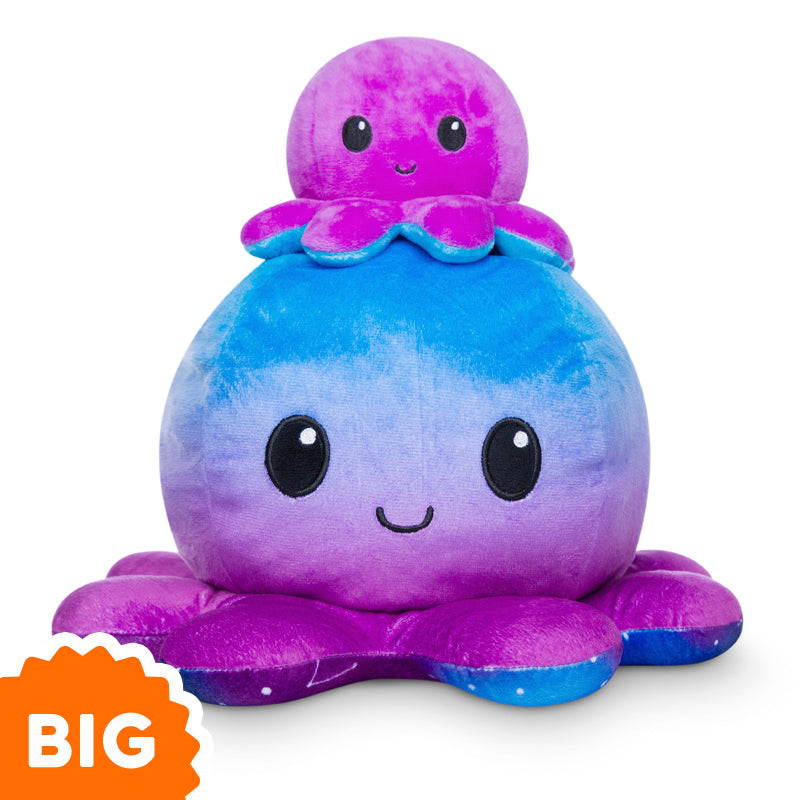 A purple and blue TeeTurtle Big Reversible Octopus Plushie (Galaxy + Blue Gradient) with the words "big octopus" from TeeTurtle.