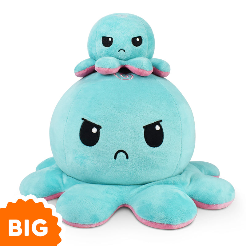 A TeeTurtle Big Reversible Octopus Plushie (Aqua + Pink) is stacked on top of another octopus.