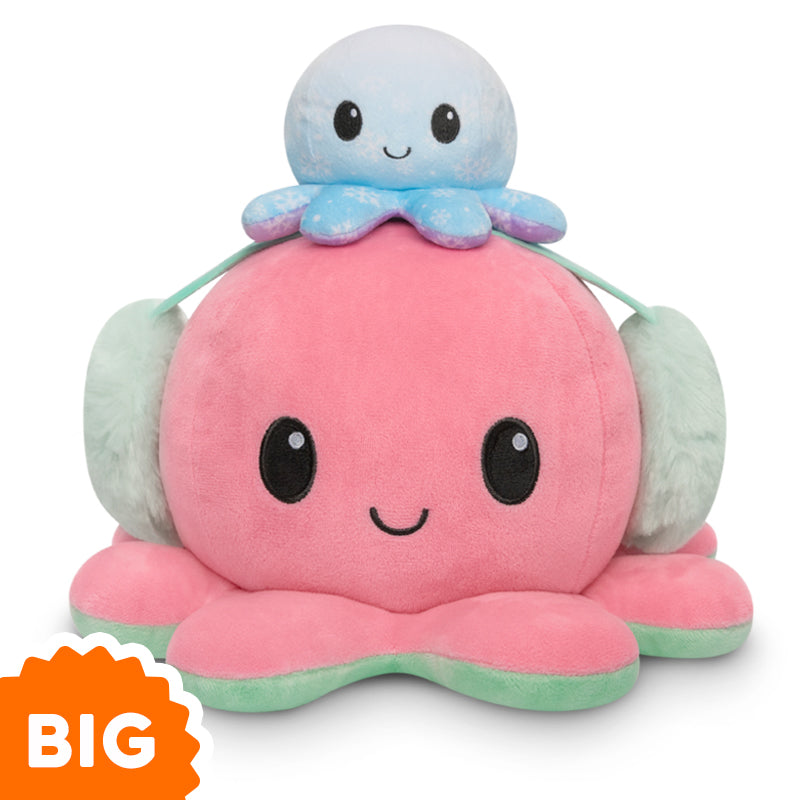 A teeTurtle Big Reversible Octopus Plushie (Earmuffs) toy is stacked on top of another octopus plushie.