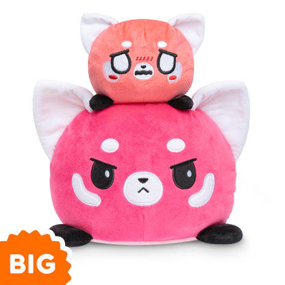 A pink and black TeeTurtle Big Reversible Red Panda Plushie with the words big plush from TeeTurtle.