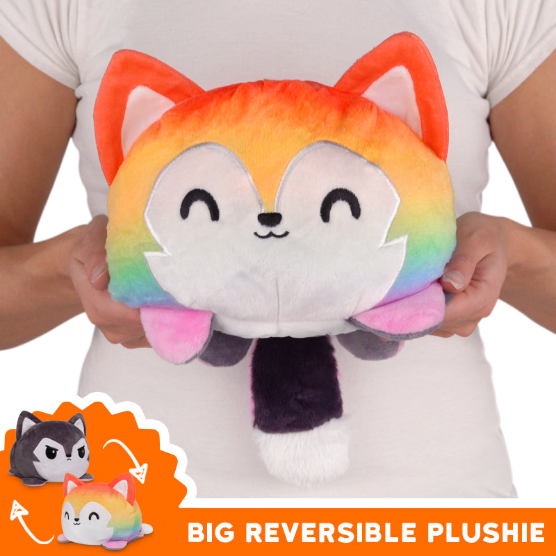 TeeTurtle presents the TeeTurtle Big Reversible Wolf Plushie - Rainbow Fox. This adorable plushie is not only huggable and cuddly, but it also features a unique reversible design. With