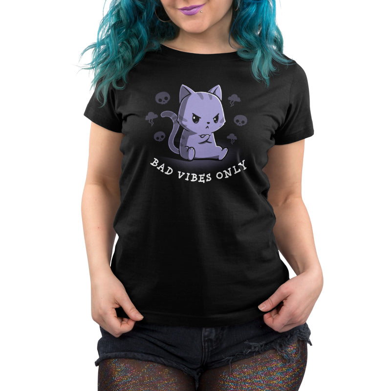 Premium Cotton T-shirt_Teeturtle Bad Vibes Only black t-shirt featuring an angry grumpy looking cat with its forepaws crossed and surrounded by skulls and lightning clouds with 'Bad Vibes Only' written underneath it.