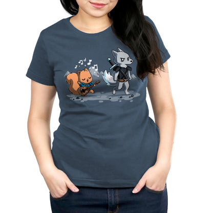 Premium Cotton T-shirt_Teeturtle Ballad of the Bard denim t-shirt featuring a squirrel playing a guitar with music notes around, while a wolf in armor holding a sword walks ahead in a mountain landscape. 